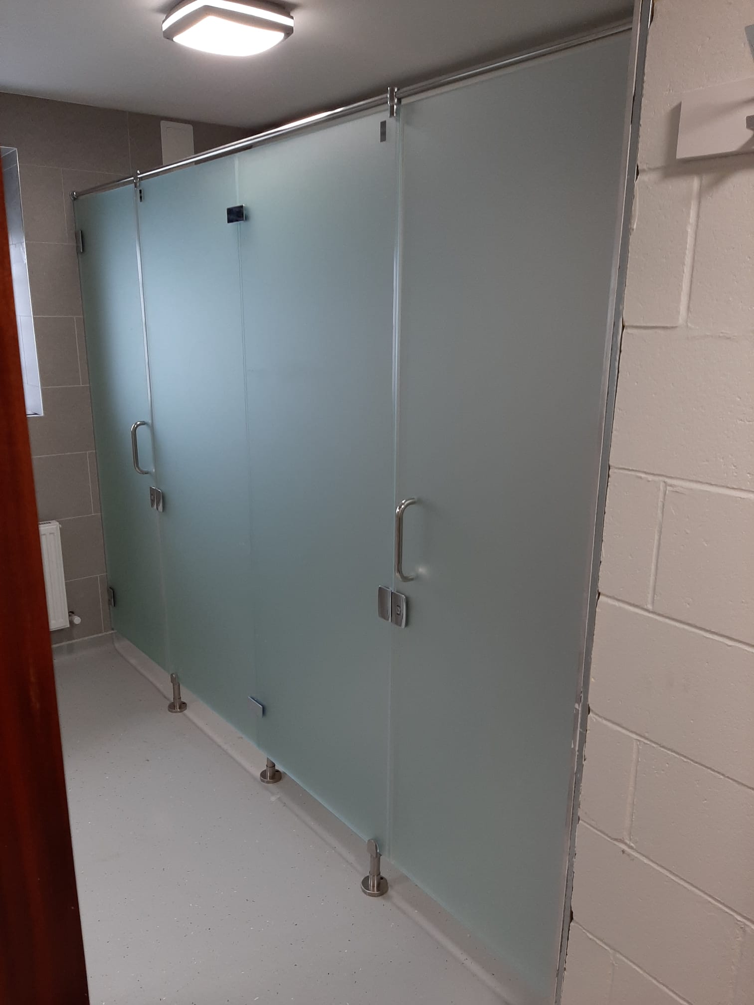 Pembroke Wanderers Hockey Club.  Shower Fit out by Huntoffice Interiors 