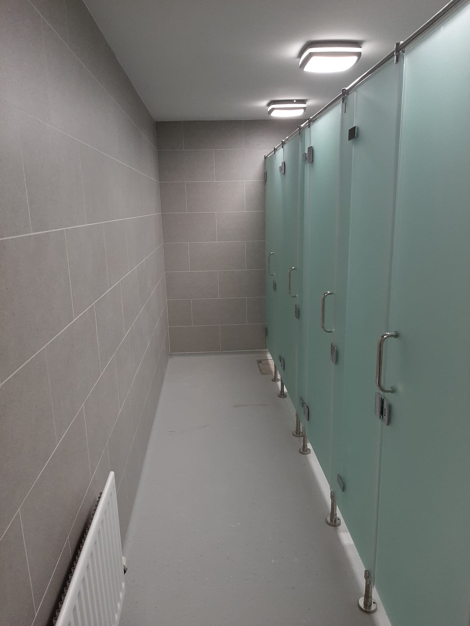 Pembroke Wanderers Hockey Club.  Shower Fit out by Huntoffice Interiors 